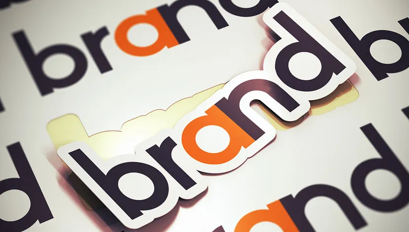 A conceptual image featuring multiple layers of the word "brand" in varying sizes and orientations, with a 3D effect on a white background.