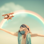 Child playing pilot under rainbow with toy plane, evoking childhood imagination and adventure.