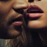 Man and woman in intimate moment about to kiss, creating tension and anticipation.