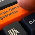 Keyboard key for Domain Name Registration: symbolizing online presence initiation.