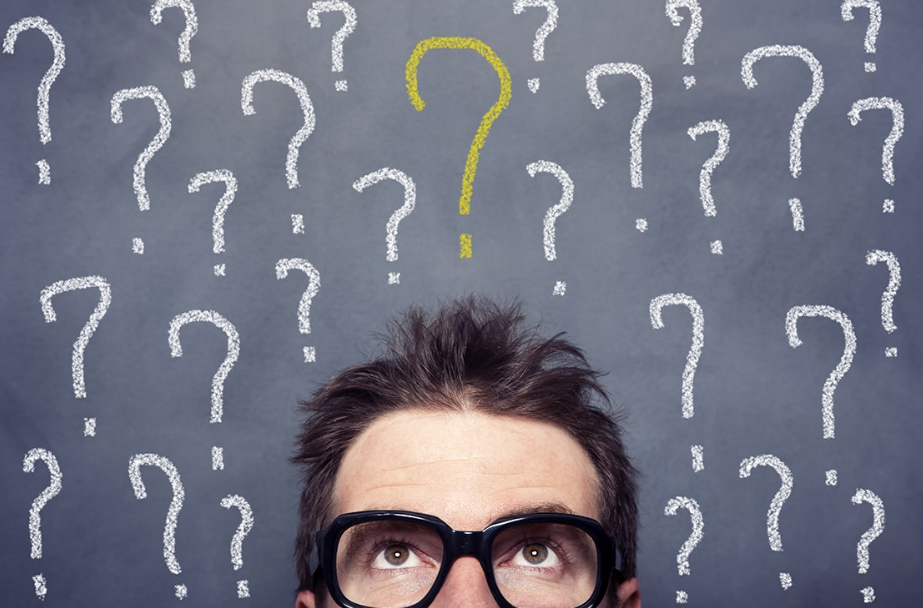 Curious person surrounded by question marks on textured grey background.