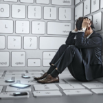Man overwhelmed in surreal keyboard setting, surrounded by dislodged keys and smartphones.