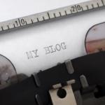 Vintage typewriter types MY BLOG on paper, showcasing classic mechanical font and retro appeal.