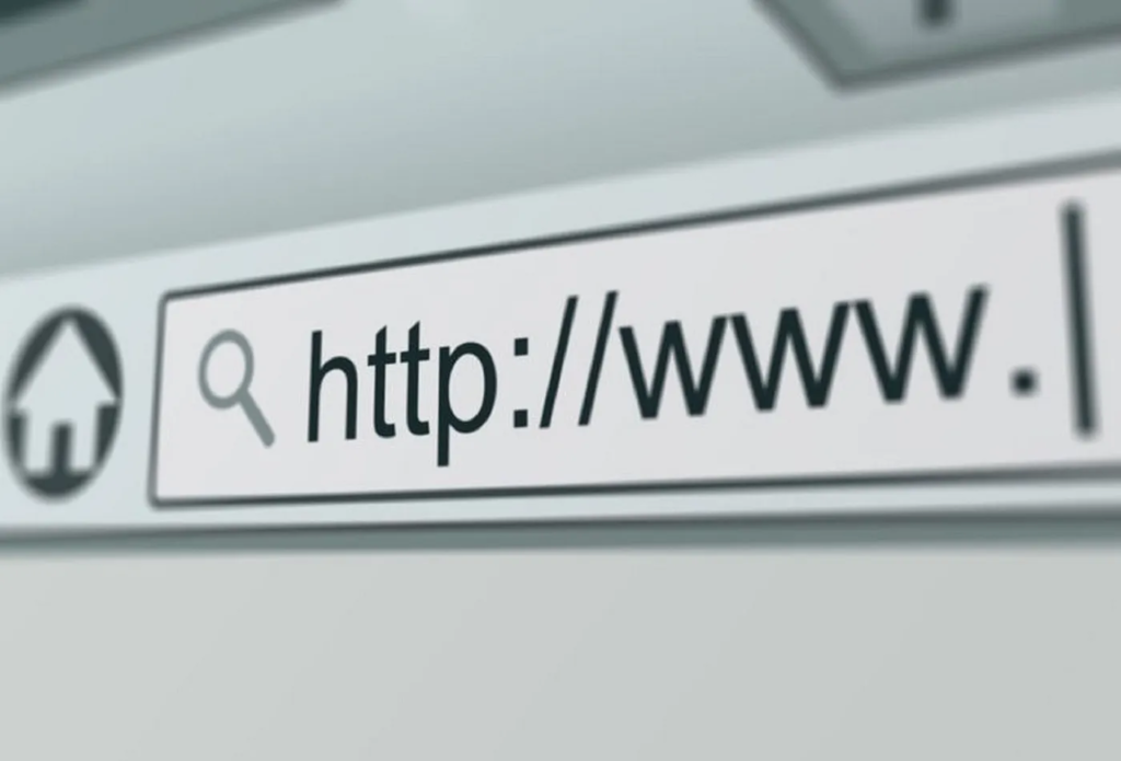 Browser address bar with a search magnifying glass icon and the beginning of a URL "http://" blurred in the background.