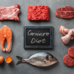 Assorted raw meats and seafood display for Carnivore Diet.