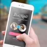 Modern dating app match with Its a Match! message on smartphone screen in urban setting.
