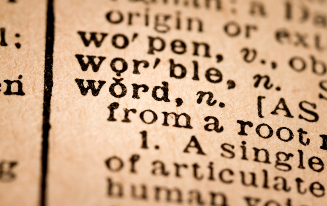 Definition and origin of word in vintage dictionary page, highlighting vocabulary depth.