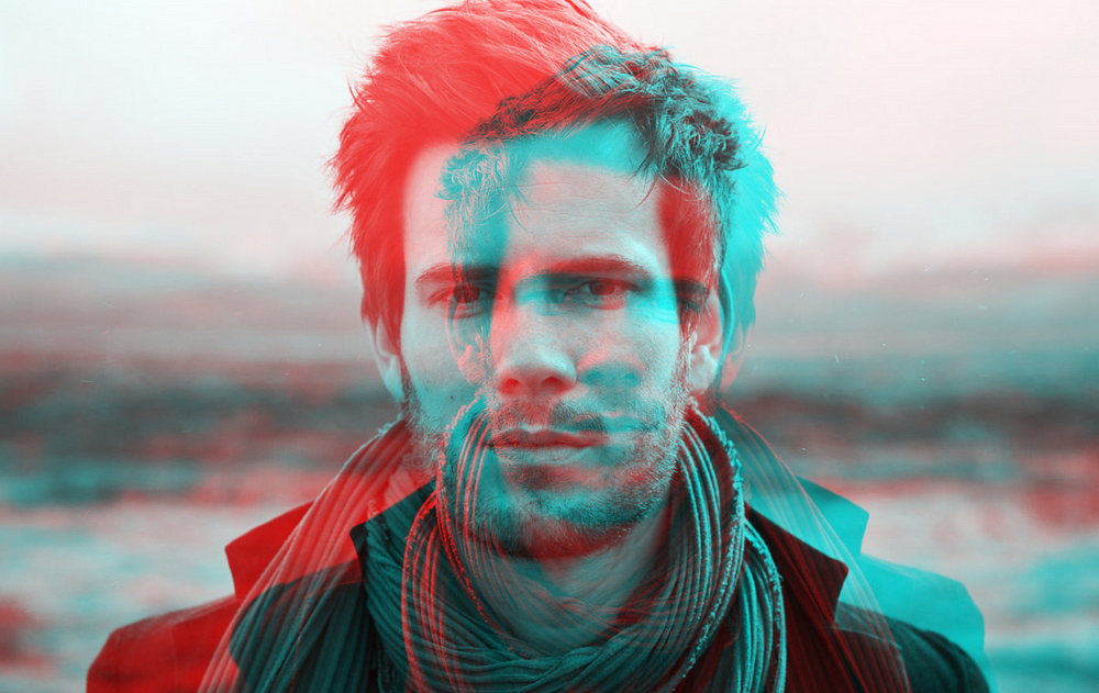 Intense gaze portrait in vibrant 3D effect with blurred outdoor background.