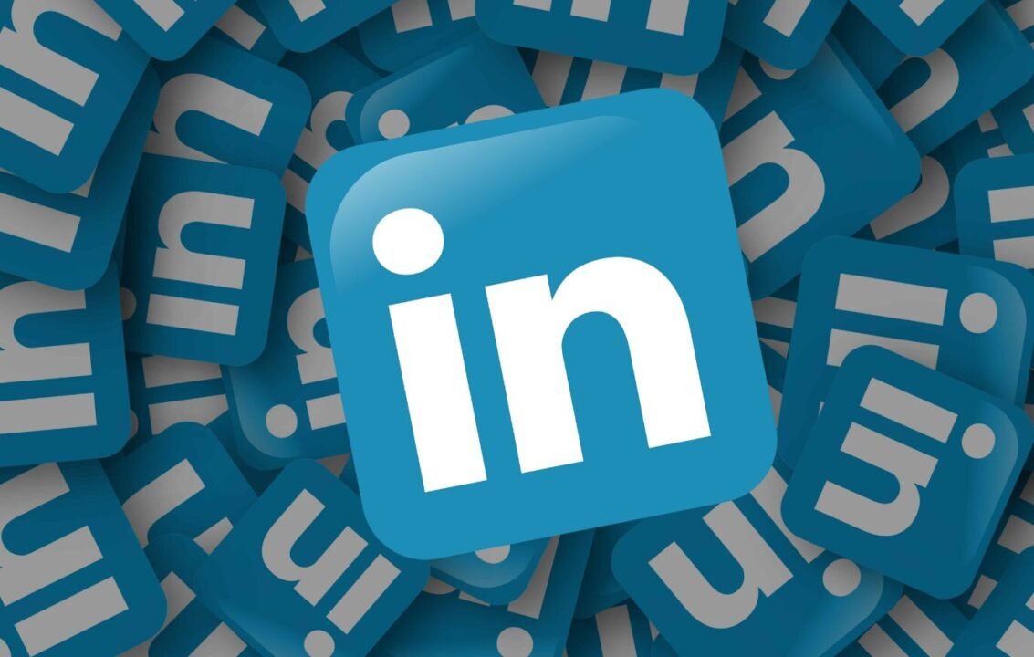 3D rendering of scattered LinkedIn logos with central logo in focus.