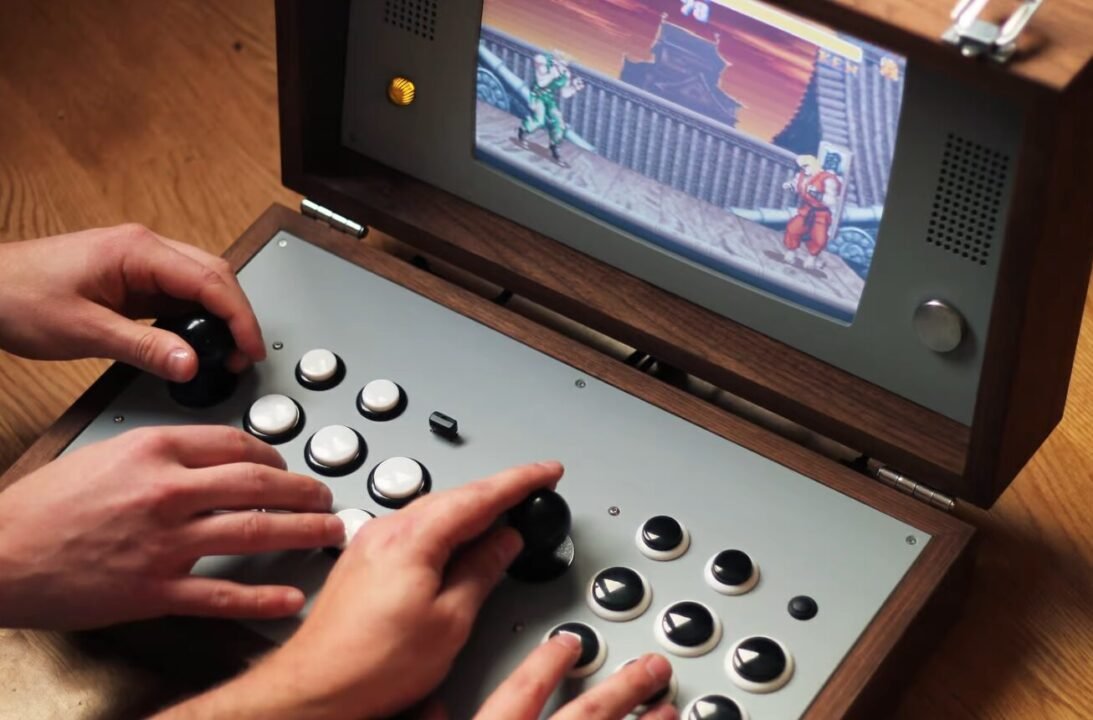 Custom arcade console with joystick, buttons, and retro fighting game on screen.