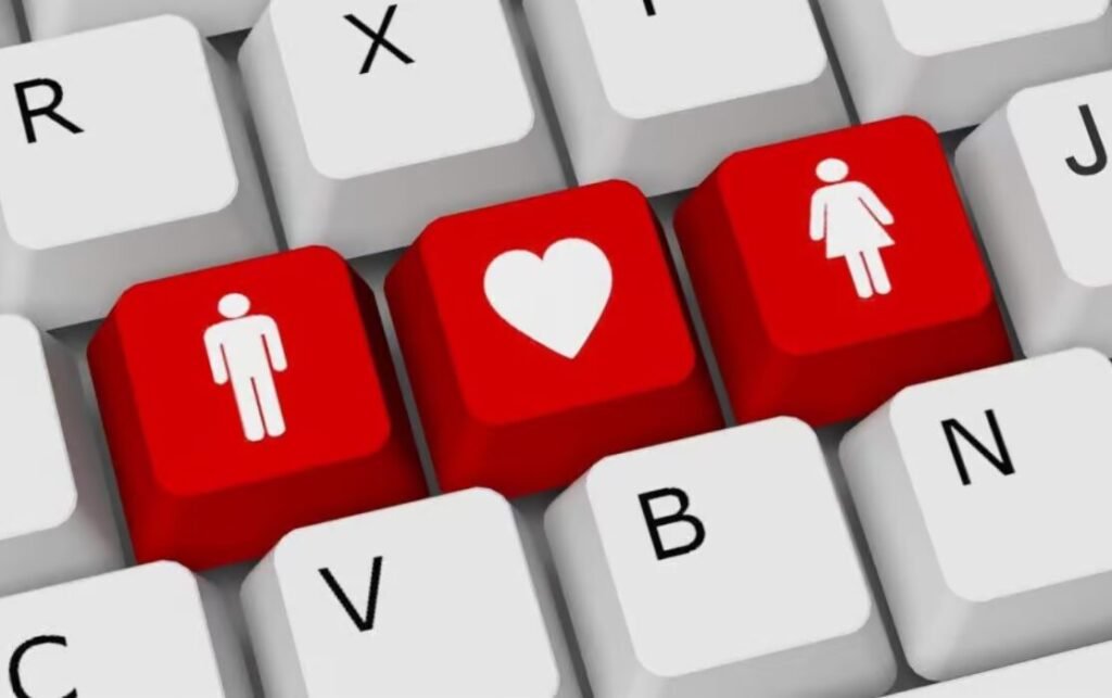 Three red computer keyboard keys with icons displaying a man, a heart, and a woman, surrounded by gray keys marked with various letters.