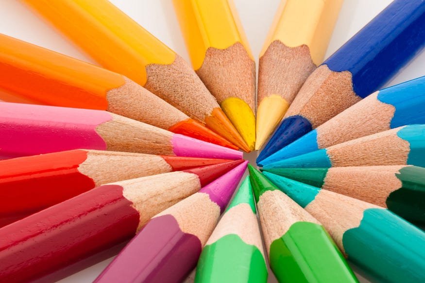 Colorful circular display of vibrant pencils in a starburst arrangement.