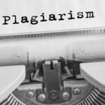 Vintage typewriter highlighting plagiarism in classic black and white.