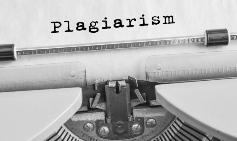 Vintage typewriter highlighting plagiarism in classic black and white.