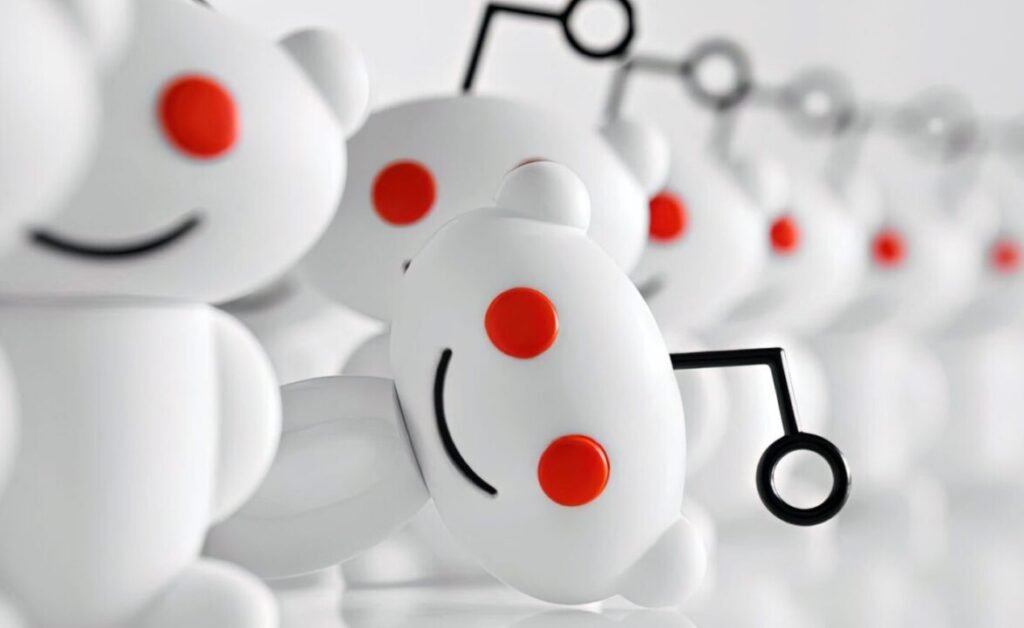 Row of white humanoid robot figures with red dots as features, connected by an articulated black joint arm.