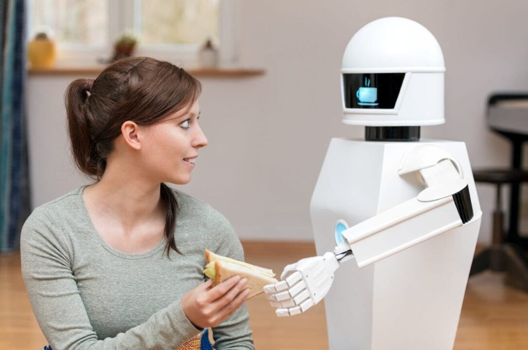 Young woman interacting with sleek humanoid robot in modern indoor setting, exchanging book or tablet.