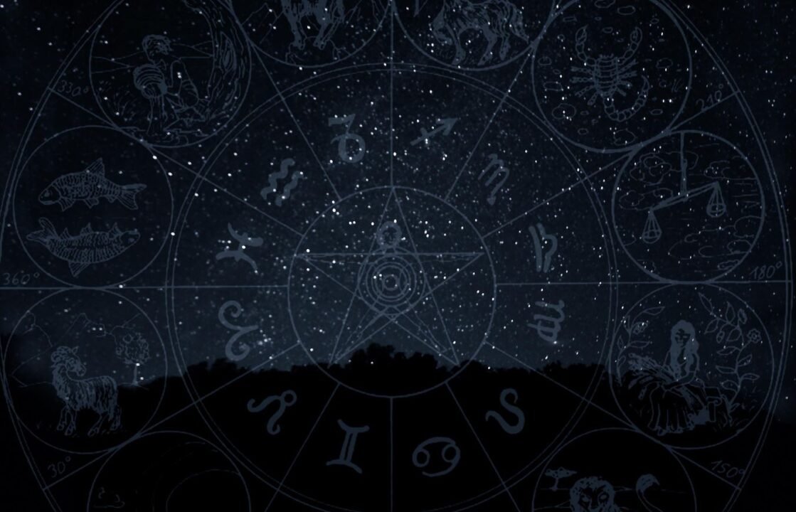 Zodiac wheel overlaid on a starry night sky.