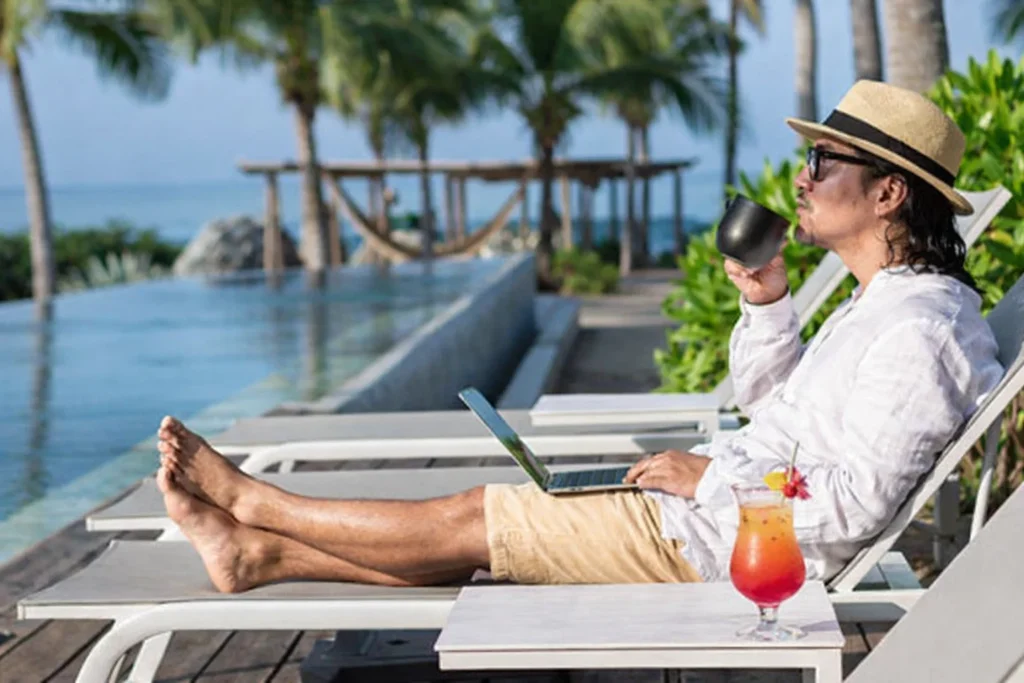 A digital nomad is working abroad.A concept for remote work,work abroad and work mobility